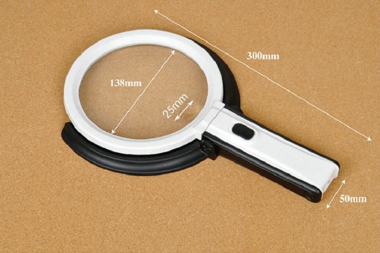 Kính lúp có đèn cầm tay kiêm chân đế để bàn