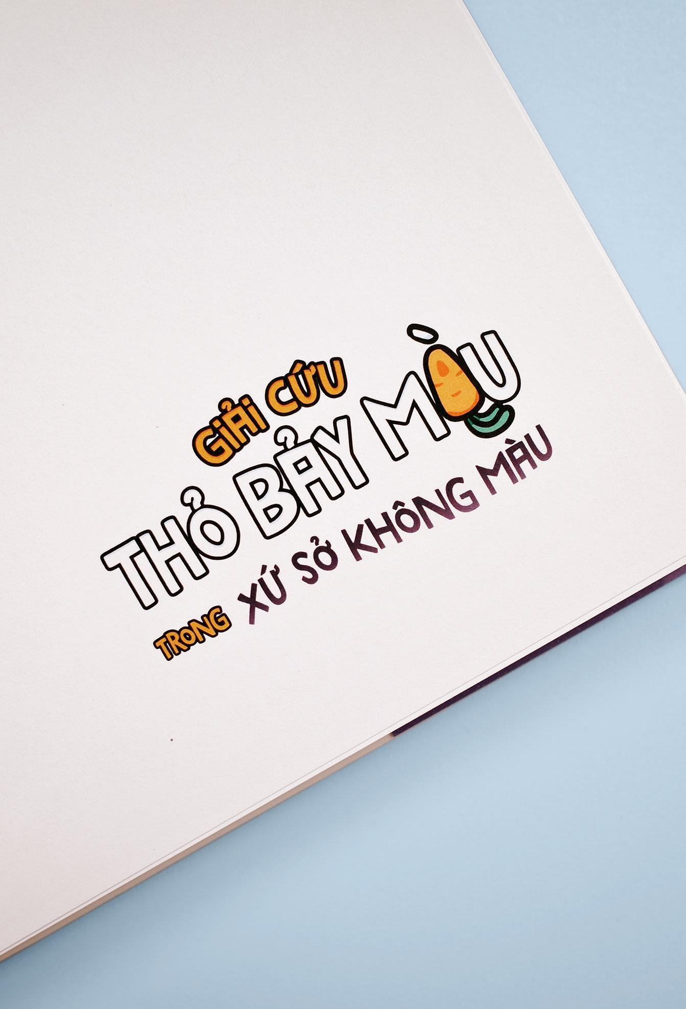 Sách - Truyện Tranh Tương Tác - Giải Cứu Thỏ Bảy Màu Trong Xứ Sở Không Màu - Bản Đặc Biệt Fahasa - Tặng Kèm 1 Bìa Áo Ngoài Phiên Bản Sáng + 1 Bookmark 2 Mặt Cán Holo + 3 Sticker Cán Holo