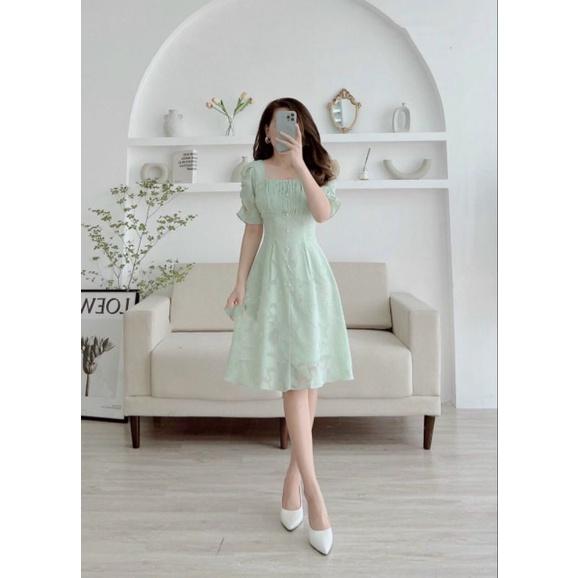 Đầm xếp ly ngực phối cúc ngọc
