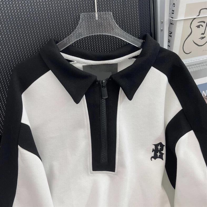 Áo Polo Cổ Khóa Pha Đen Trắng Thêu Sao Unisex Dáng Rộng