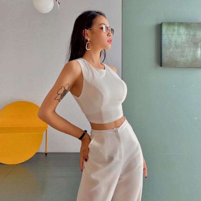 QUẢNG CHÂU Áo croptop chéo lưng, thắt nơ, cổ tròn, sát nách mang lại vẻ ngoài trẻ trung, năng động, cá tín