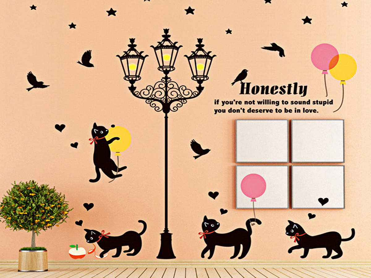 Decal dán tường cột đèn và đàn mèo đen