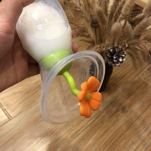 Combo Cốc hứng sữa Gen.1 100ml và Nút hoa chặn Haakaa. Chất liệu silicone cao cấp, an toàn. Không chứa BPA, PVC và phthalate