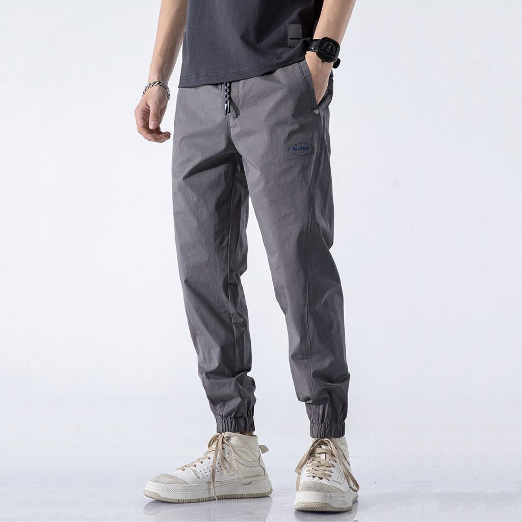 Quần jogger nam trơn cạp chun chất gió mềm co dãn viền ly đứng dáng nổi bật phong cách thể thao