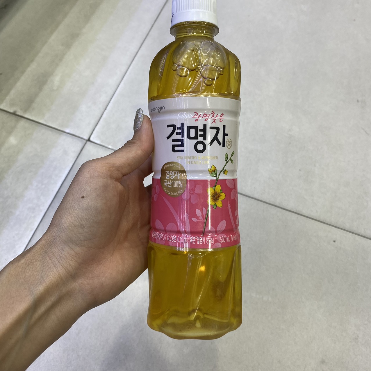 Nước Uống Trà Hạt Muồng Woongjin Hàn Quốc Chai 500ML / 웅진) 결명자차 500ML