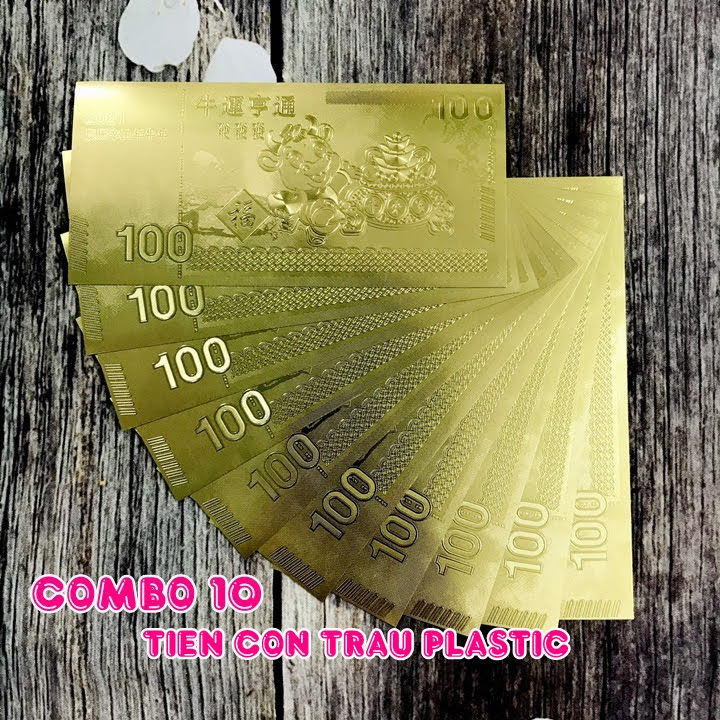 Combo 10 tờ lưu niệm 100 hình con Trâu, chất liệu nhựa plastic mạ một lớp màu vàng, dùng để trang trí trong nhà, làm tiền lì xì dịp Tết Tân Sửu 2021, treo trên cây mai, bỏ vào túi xách - SP005094