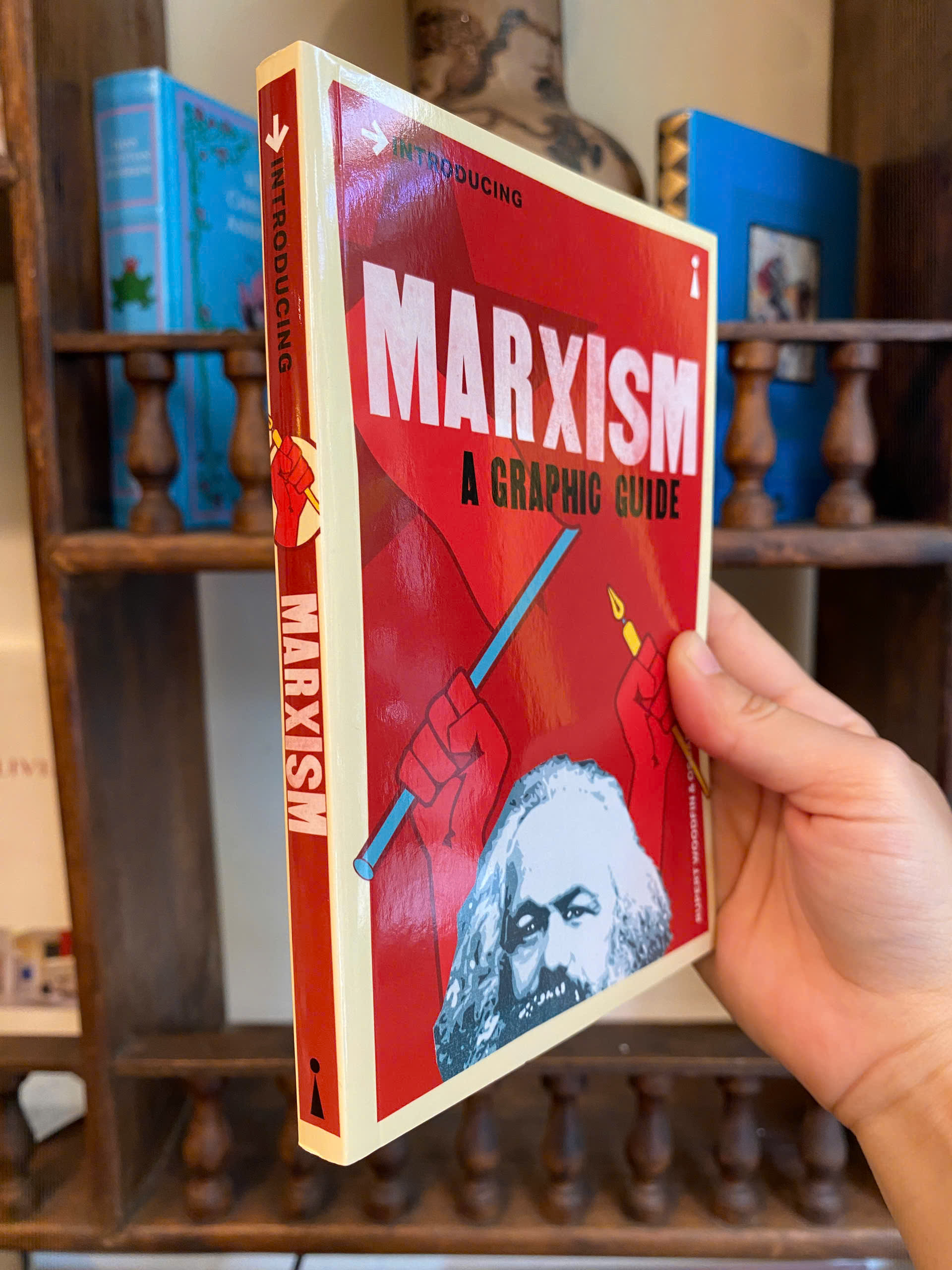 Sách - Introducing Marxism: A Graphic Guide by Rupert Woodfin | Philosophy / Biography Nonfiction