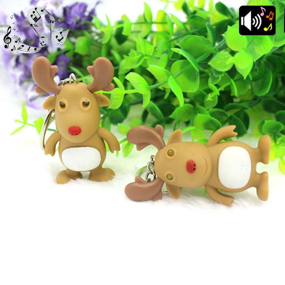 Móc khóa hình con tuần lộc giáng sinh phát sáng đèn Led có đèn có âm thanh