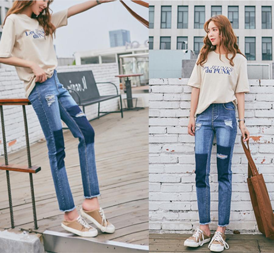 Quần Jeans nữ rách chân tua rua