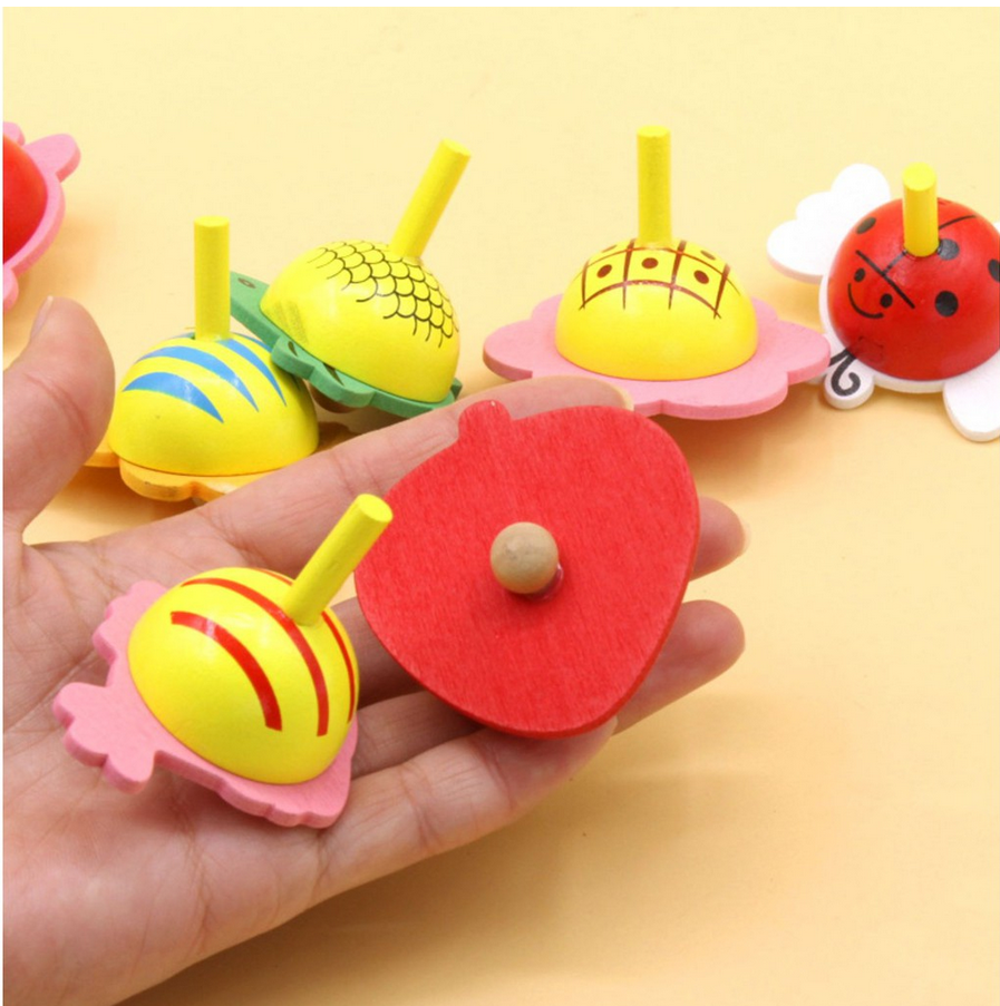 Con quay trẻ em nhiều hình độc đáo - Chất liệu gỗ an toàn thân thiện cho bé - Giao màu ngẫu nhiên