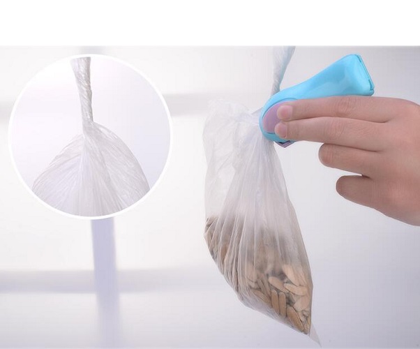 Máy hàn miệng túi cầm tay mini bảo quản thực phẩm 10*4*5 cm, giao màu ngẫu nhiên+ Tặng kèm 2 viên Pin Và Tặng kèm hình dán ngẫu nhiên