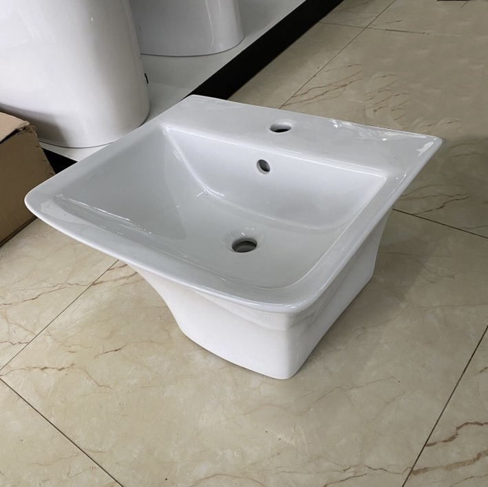 Chậu lavabo treo tường liền chân màu trắng phong cách hiện đại