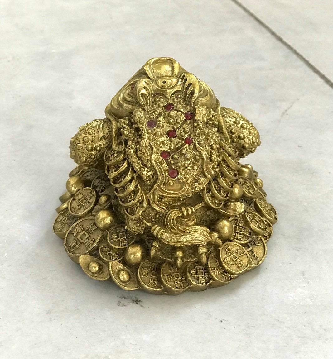 Cóc cuốn thư bằng đồng