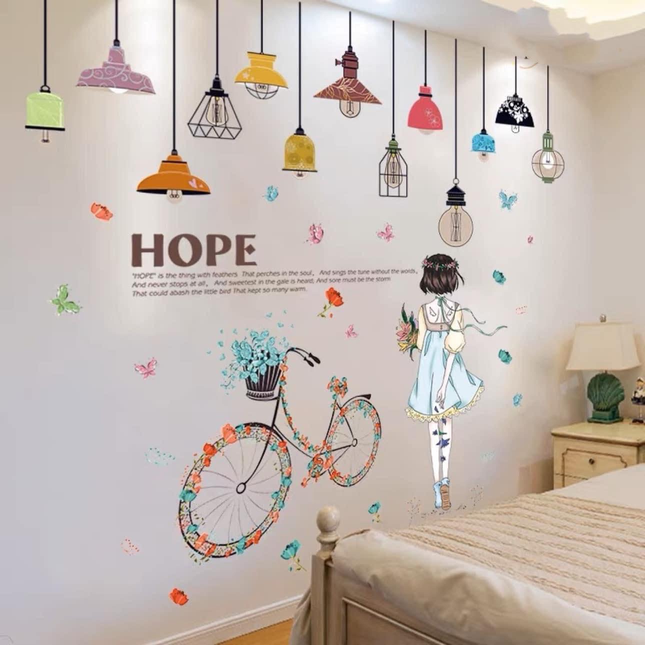 DECAL DÁN TƯỜNG CHÙM ĐÈN HOPE VÀ CÔ GÁI XE ĐẠP