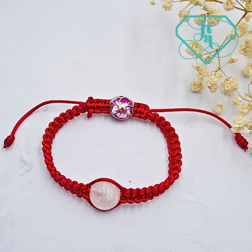 Vòng thắt dây thạch anh hồng mix charm VTD-02