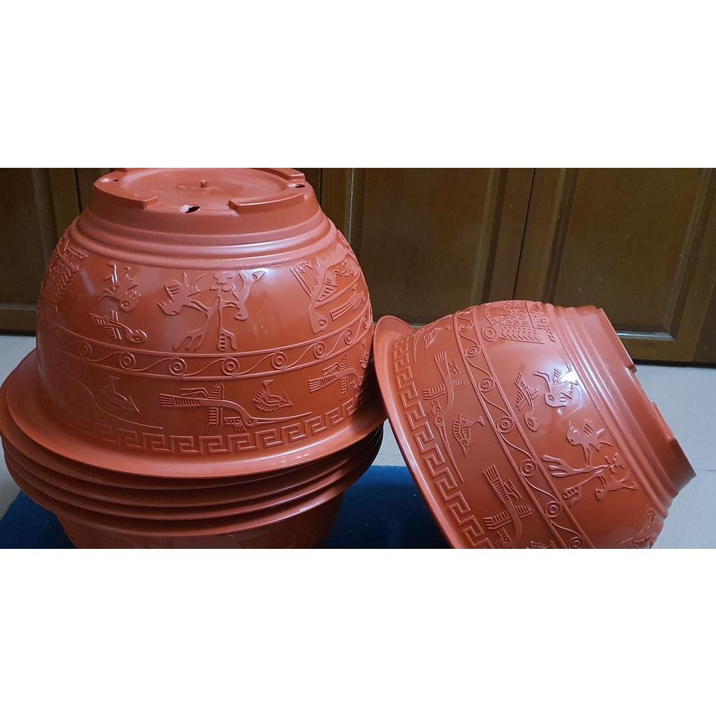 Chậu nhựa tròn T48 đỏ hoa văn đa dạng.