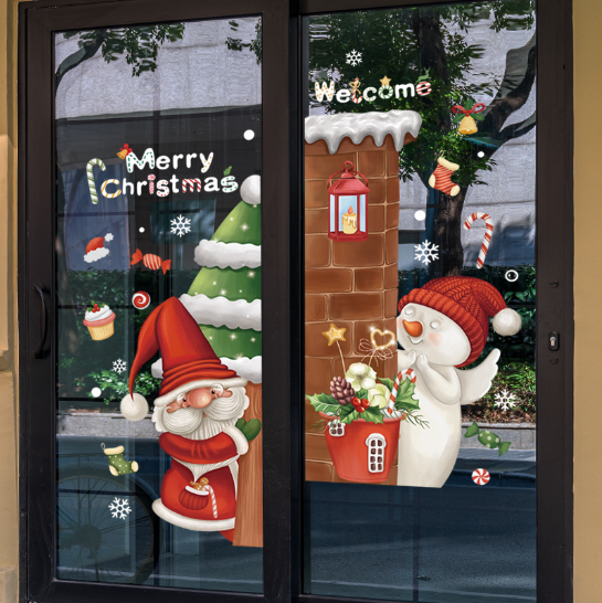 Decal trang trí Noel - Ông già Noel ôm cây thông