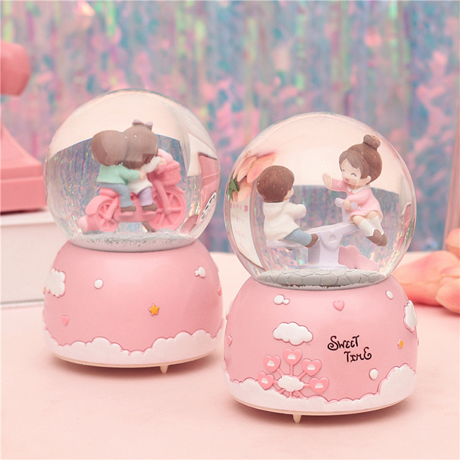 Hộp nhạc quả cầu tuyết xe đạp teen