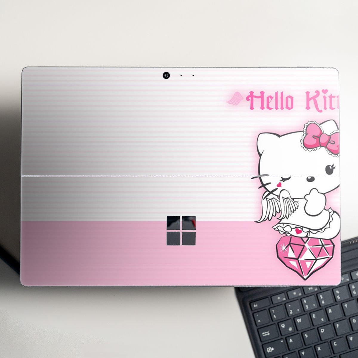 Skin dán hình Hello Kitty cho Surface Go, Pro 2, Pro 3, Pro 4, Pro 5, Pro 6, Pro 7, Pro X