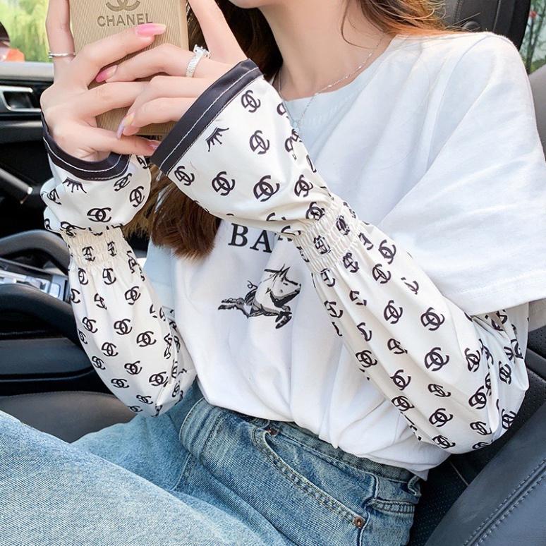 Găng tay chống nắng chống tia UV xỏ ngón dáng rộng vải lụa mát in hoa thời trang - Kanta store