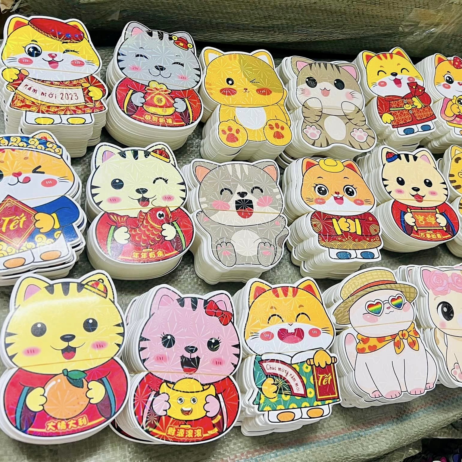 Bao Lì Xì Chibi Hoạt Hình Dễ Thương Có PHẢN QUANG Mừng Tuổi Tết Quý Mão 2023 (Set 10 - 50 Bao