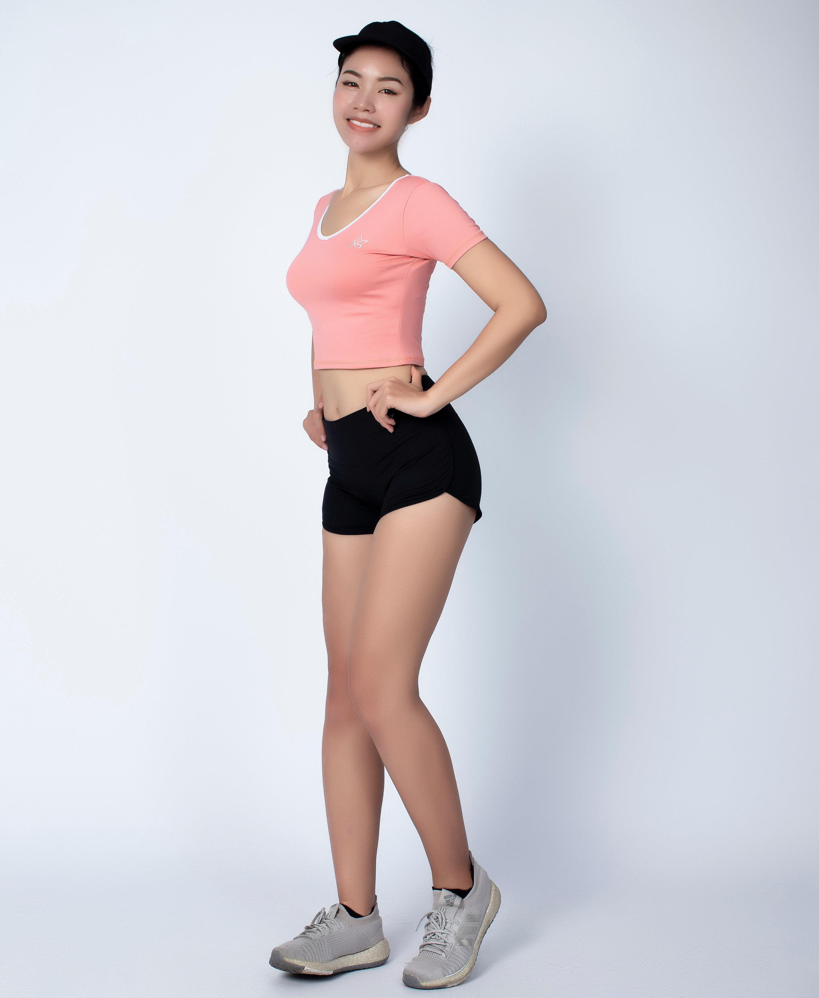 Bộ thể thao nữ quần short chữ V áo croptop có tay màu Cam - DN110