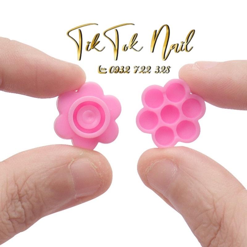 Nút hoa mai chấm keo mi