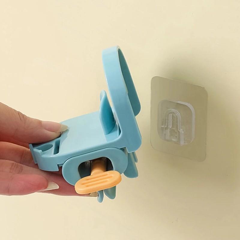 Dụng cụ nặn kem đánh răng dán tường kiêm giá treo bàn chải cực đa năng