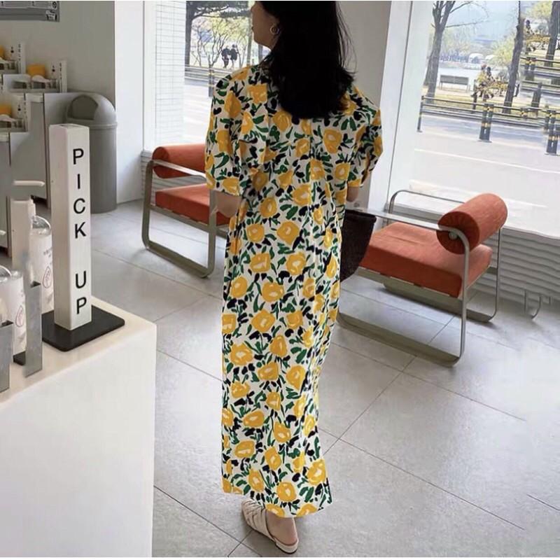 Váy maxi hoa cúc vàng nổi bật