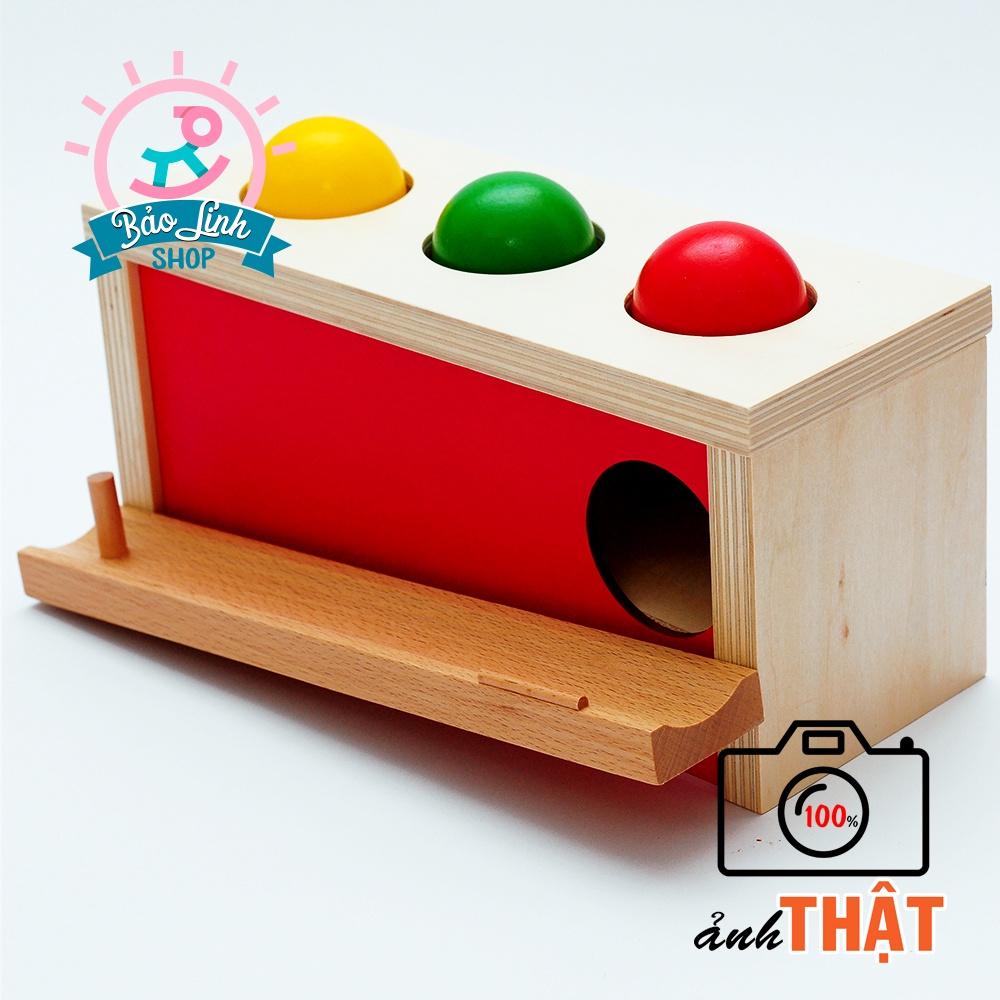 Hộp ấn bóng - Giáo cụ Montessori cho bé 9-12 tháng - Rèn luyện lực bàn tay, ngón tay - Phối hợp tay và mắt