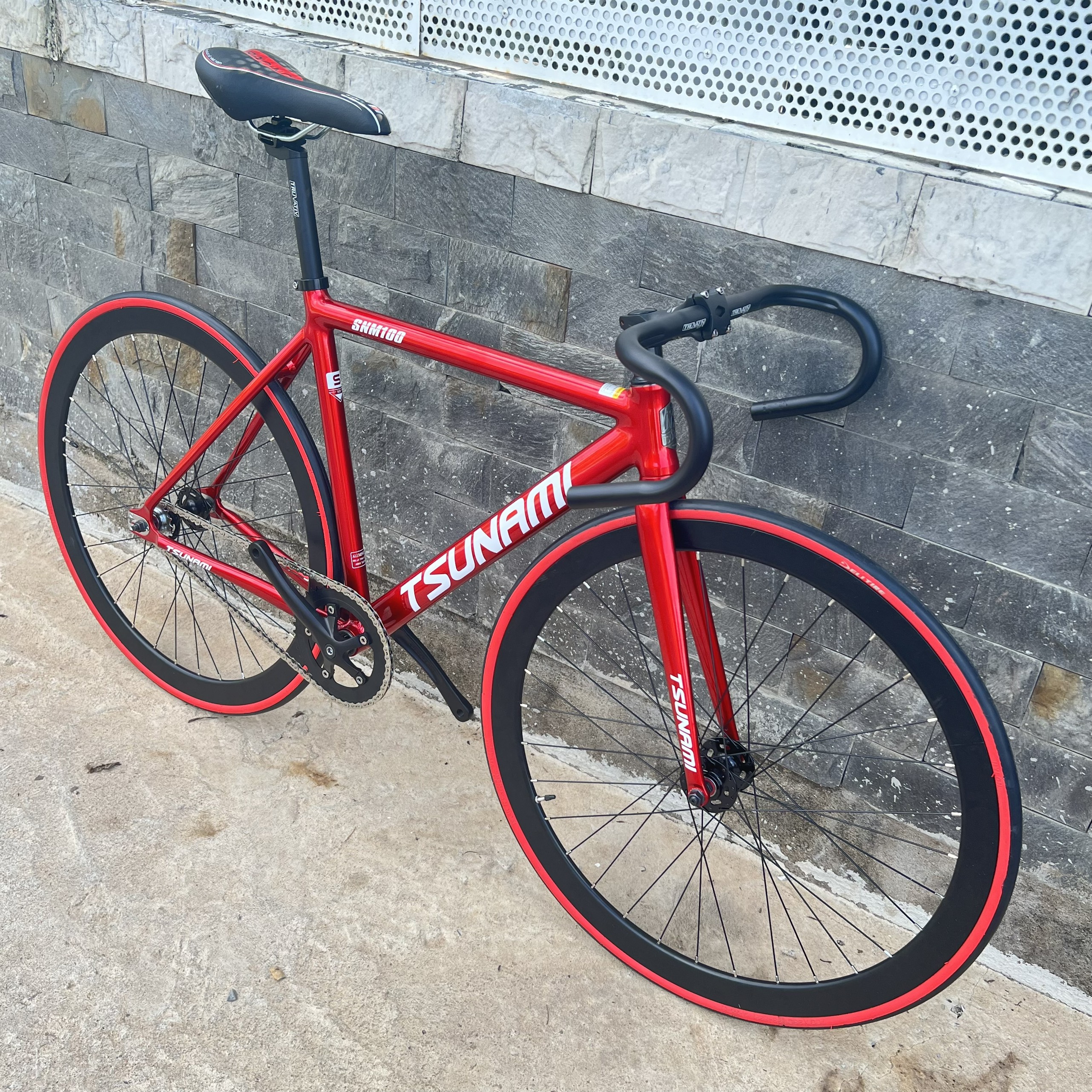 Xe đạp fixed gear TSUNAMI SNM100 cơ bản - Màu đỏ