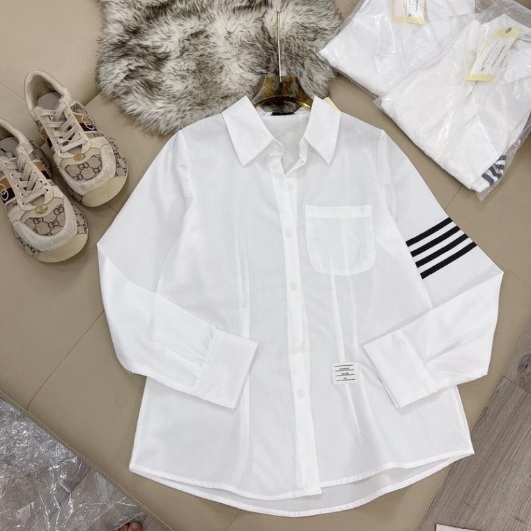 Áo sơ mi nữ trắng dáng công sở viền sọc tay