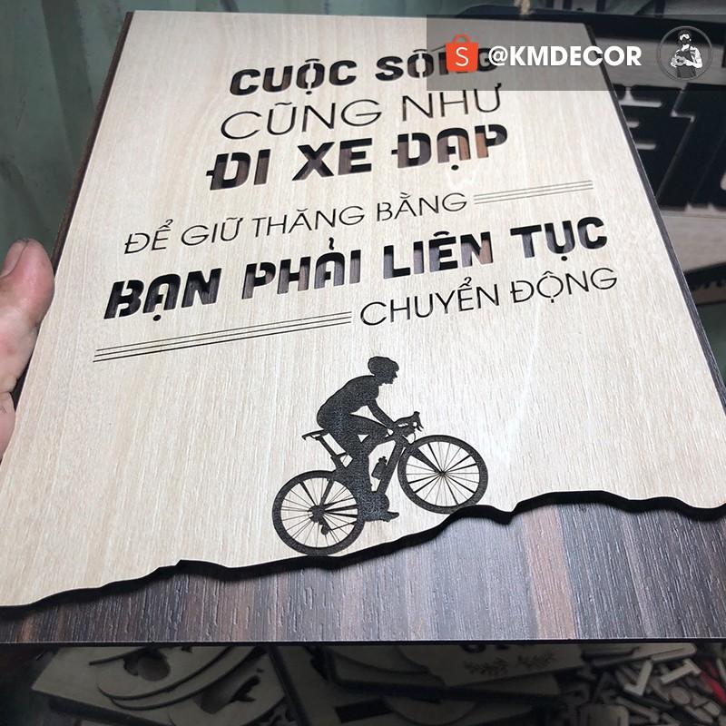 Tran gỗ TBIG - Tạo động lực mẫu câu "cuộc sống cũng như đi xe đạp để giữ thăng bằng bạn phải liên tục chuyển động"