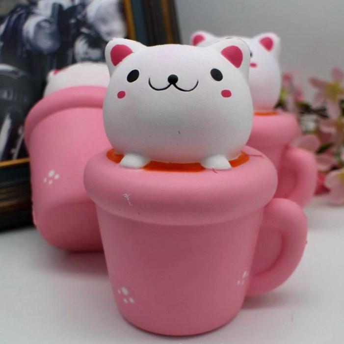 Squishy MÈO HỒNG nằm trong cốc squishy cốc thỏ hồng dễ thương ngộ nghĩnh