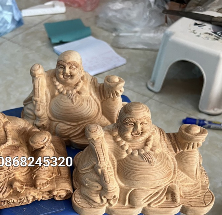 Tượng phật di lặc mini nâng thỏi vàng gỗ ngọc am thơm nức kt 15×9×9cm