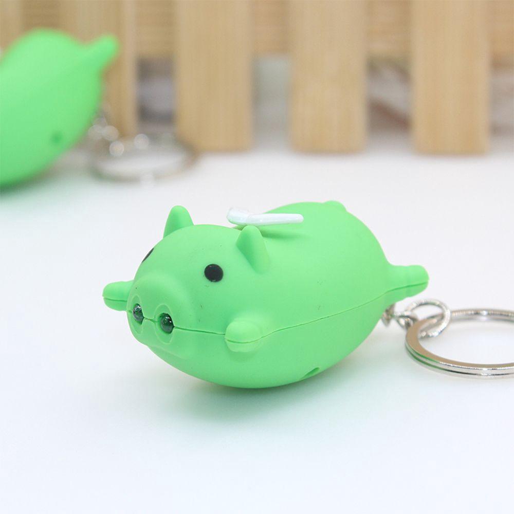 Móc khóa hình con heo có đôi cánh thiên thần phát sáng đèn Led có nhạc có đèn-Móc khóa hình heo phát sáng