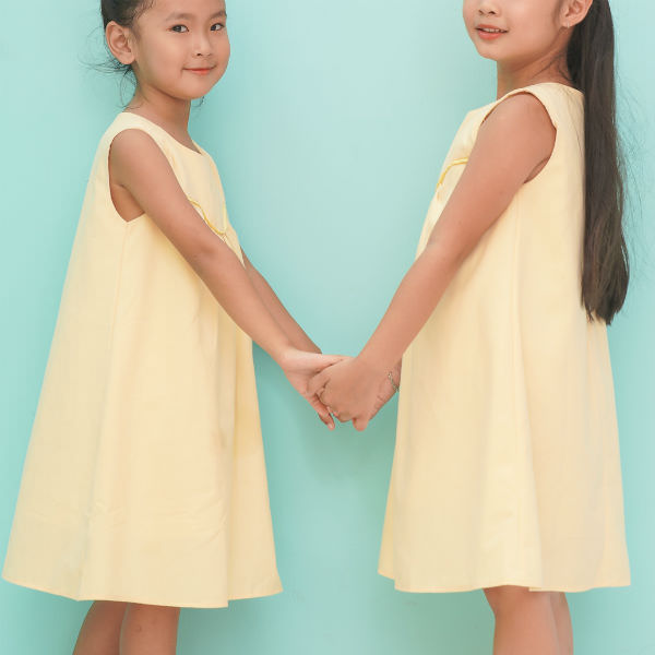 Đầm Bé Gái Viền Ngực Vòng Cung Ugether UKID212 - Vàng Nhạt