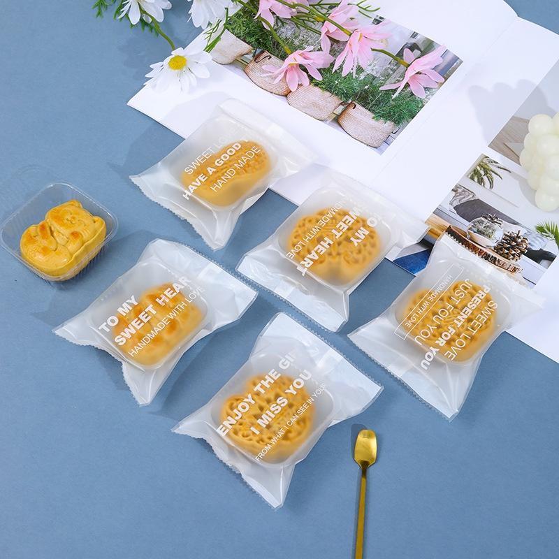 100 Túi Đựng Bánh Kẹo, Bao Bì Đựng Trà, Bánh Kẹo Họa Tiết Chữ Tiếng Anh Trắng 4 Trong 1 - VUA BAO BÌ