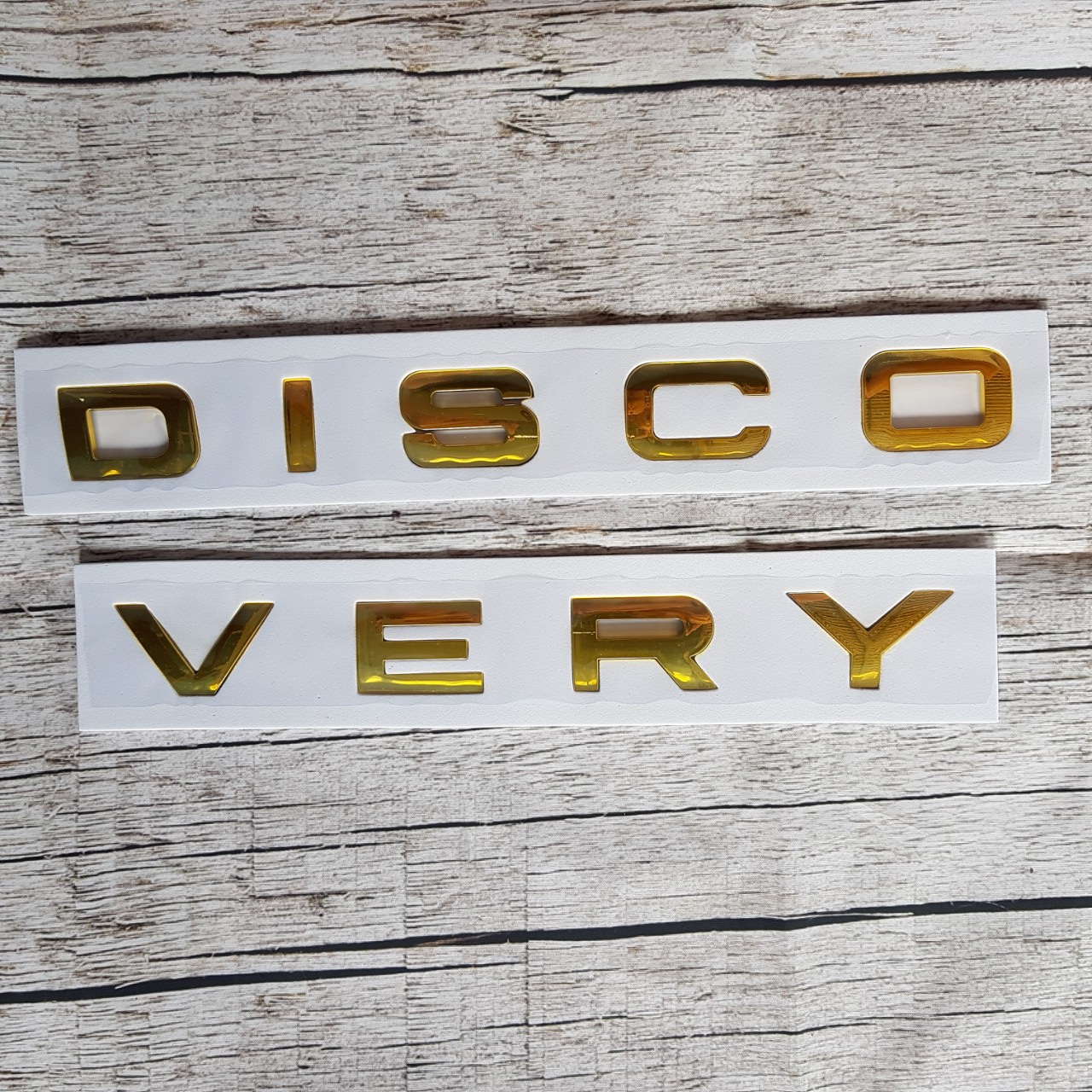 Tem DISCOVERY chữ nổi dán trang trí nắp CAPO ô tô