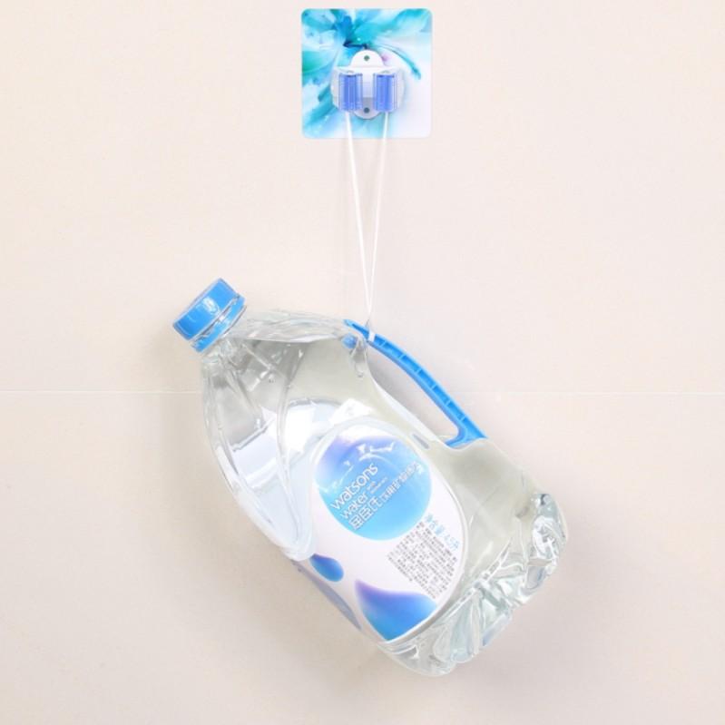 Dụng cụ kẹp đồ vật dán tường thông minh