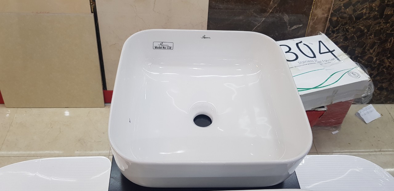 Chậu lavabo đặt bàn Bancoot L58, hàng chính hãng, loại 1 trắng sứ cao cấp