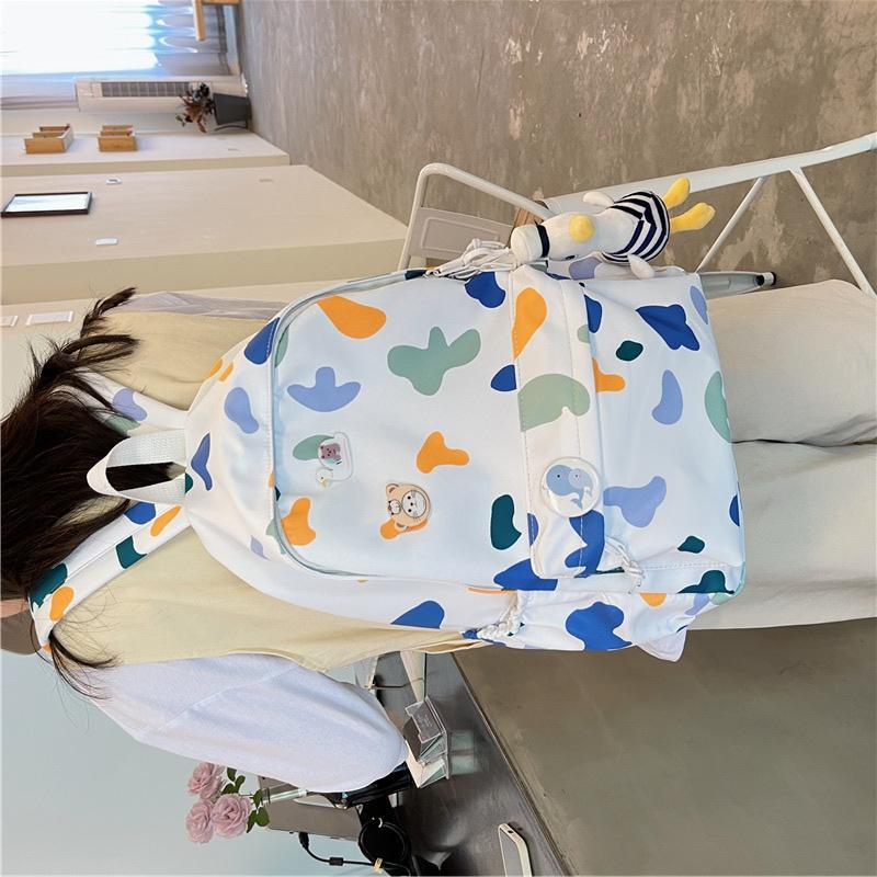 Ba lô học sinh nữ phong cách mới nhất phong cách Hàn Quốc thời trang học sinh trung học ba lô nylon in ba lô hợp thời trang sức chứa lớn ba lô học sinh trung học cơ sở