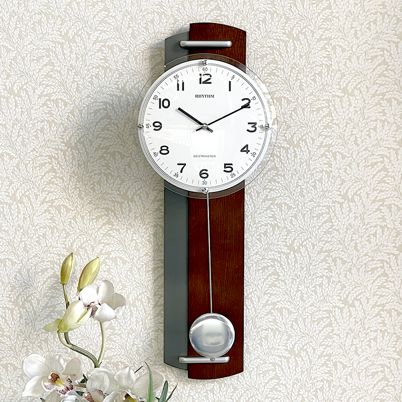 Đồng hồ treo tường Rhythm CMJ592NR06- Kt 22.8 x 58.3 x 10.0cm, 1.15kg. Vỏ gỗ, dùng PIN.