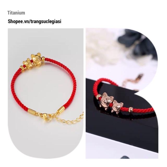 Vòng tay titan dây đỏ 2 heo