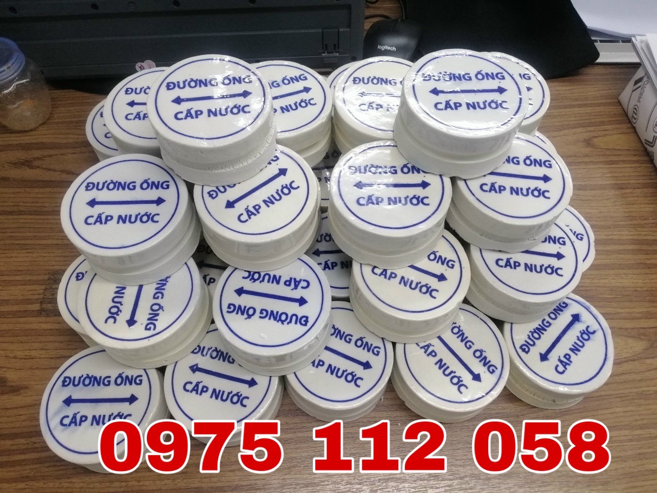 Mốc sứ báo cáp