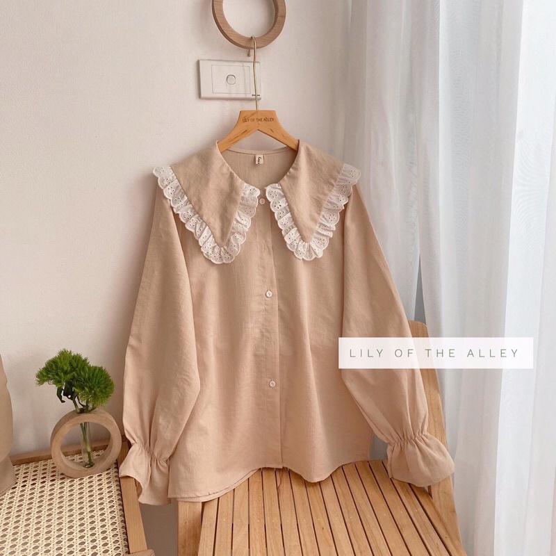 Sơ mi đũi xước cổ búp bê viền ren
