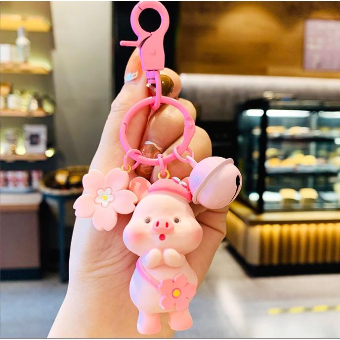 Móc khóa heo con biêu cảm có chuông kêu dễ thương xỉu PVC loại tốt