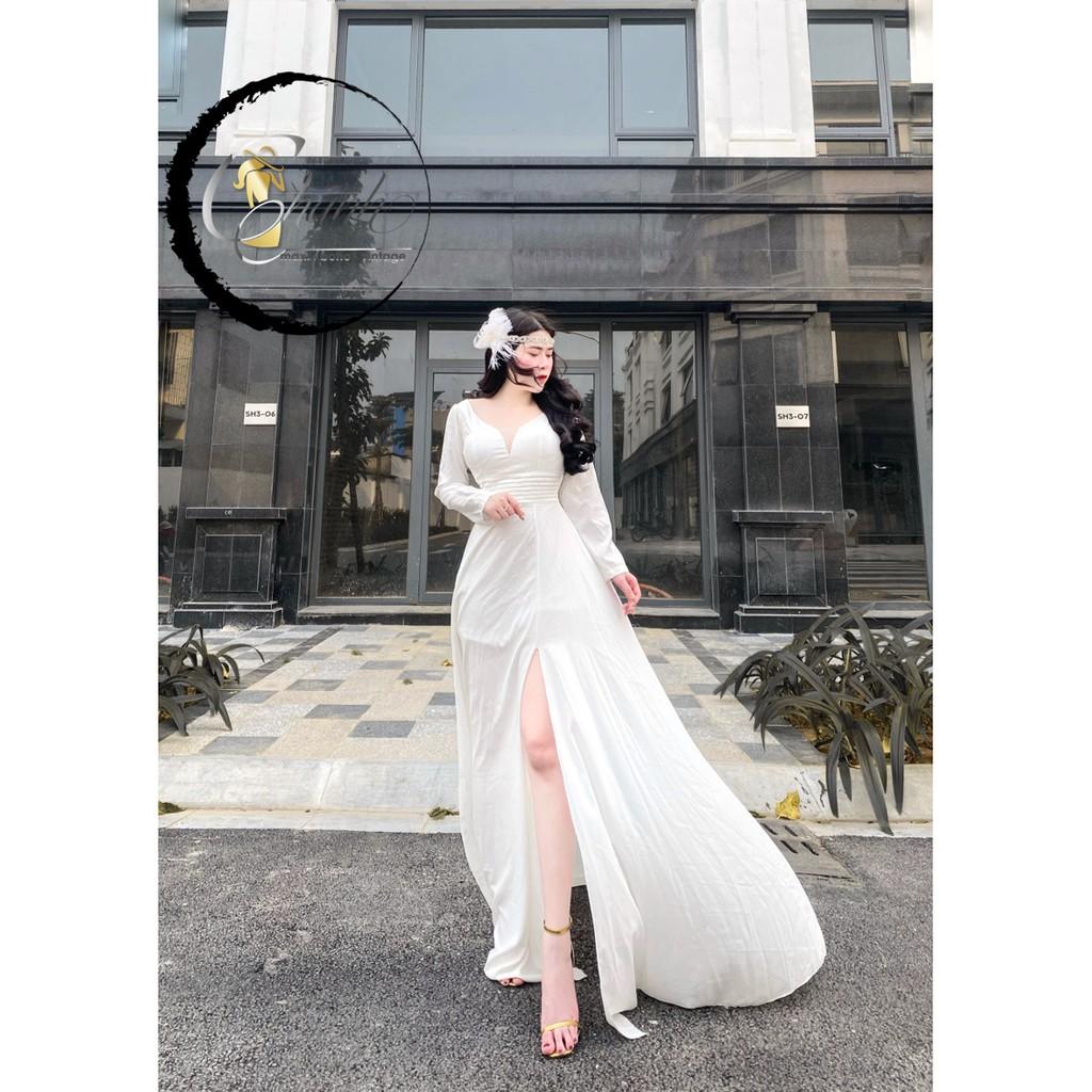 Đầm xẻ tà trắng dài tay cực xang chảnh