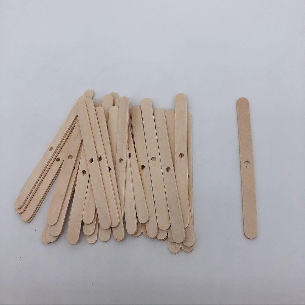 Que gỗ đỡ bấc loại có lỗ