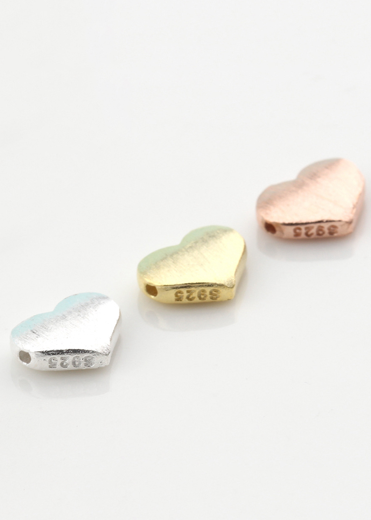 Combo 2 cái charm bạc trái tim xỏ ngang - Ngọc Quý Gemstones